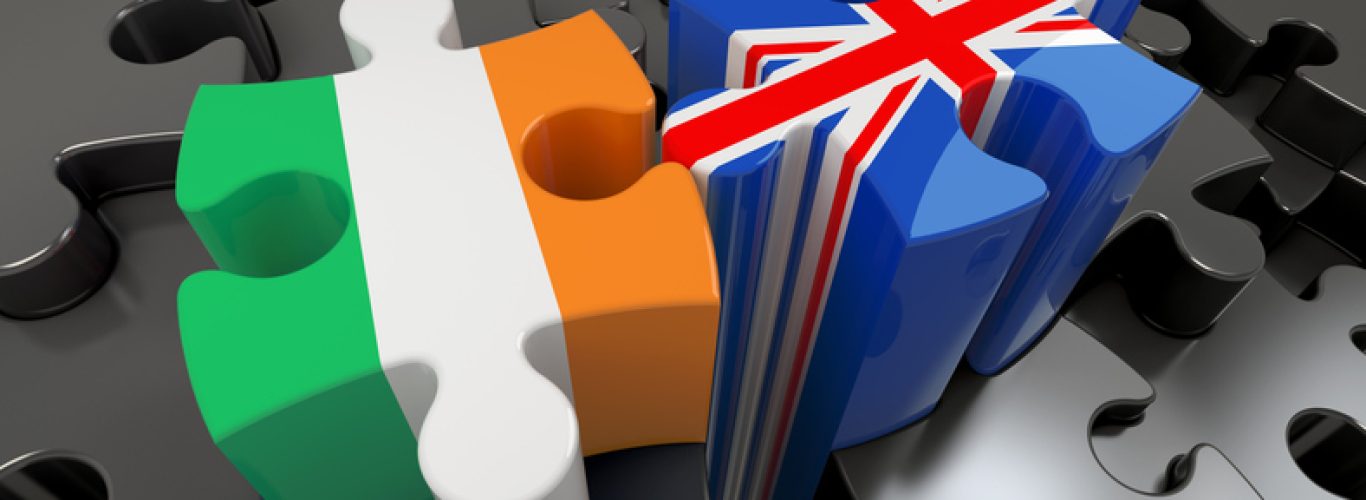 Ireland and United Kingdom flags on puzzle pieces. Political relationship concept. 3D rendering
